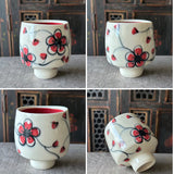 one-of-a-kind cherry blossom wine cup #39, red interior glaze showing for sides of the same cup in one photo