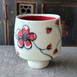 one-of-a-kind cherry blossom wine cup #39, red interior glaze, top view showing red inside